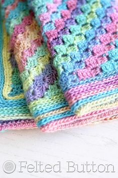 crocheted blanket made with multicolored yarn