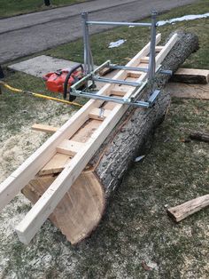 a large log being worked on by a chainsaw