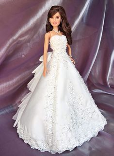 a barbie doll dressed in a white wedding dress