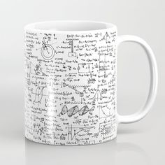 a white coffee mug with lots of writing on it