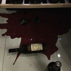 a bottle of wine sitting on top of a counter