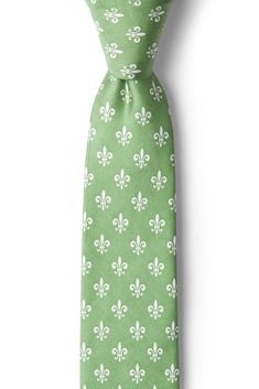 Feel a little regal with our Fleur Crazy Skinny Tie in moss green. This tie features a pattern of fleur-de-lis atop a mint green background and is made of 100% silk. Imported. Elegant Green Tie For Spring, Elegant Green Spring Ties, Elegant Green Ties For Spring, Green Spring Ties, Formal Green Spring Tie, Spring Formal Green Tie, Spring Green Formal Tie, Elegant Green Summer Tie, Elegant Green Summer Ties