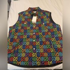 Gucci Authentic Multicolor Vest Size 48/ Mens Large/Xl. Purchased At Sample Sale. Tags Are Attached. Gucci Luxury Cotton Outerwear, Luxury Gucci Cotton Outerwear, Gucci Designer Cotton Outerwear, Designer Gucci Cotton Outerwear, Gucci Black Outerwear For Streetwear, Gucci Multicolor Outerwear For Fall, Gucci Multicolor Fall Outerwear, Gucci Jackets, Gucci Brand