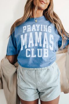 Discover the perfect gift for the Christian mom in your life! This 'Praying Mamas Club' t-shirt is not only stylish but also carries a powerful message. Made with the ever-so-soft, comfort colors tees and available in various sizes, it's a thoughtful and memorable way for her to show her faith in style. Don't miss the chance – grab one for your Christian mom or wife today! #motherdaygift #giftformom #christianmom #christianshirts #christianliving #christianapparel #faithbasedapparel Cotton Tops For Family Gatherings On Mother's Day, Cotton Top For Family Gatherings On Mother's Day, Blue Top With Letter Print For Family Reunion, Blue Graphic Print Top For Family Reunion, Blue Graphic Print Tops For Family Reunion, Cotton Crew Neck T-shirt For Family Gatherings, Crew Neck Cotton T-shirt For Family Gatherings, Printed Cotton T-shirt For Family Gatherings, Cotton Graphic Print T-shirt For Family Gatherings