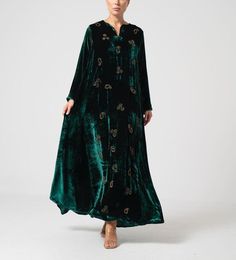 Peacock Green with embroidery Velvet one piece kaftan Featuring an Peacock Green with embroidery Velvet one piece kaftan with handcrafted as and wherever is required of zardosi, cutdana, resham, sequins,dabka embroidery, floral butti & scallop motif embellishment & gota work.  For collection visit --  https://www.indberry.com This product will be shipped to you after 1-2 weeks from the date of order placed. All custom made orders are not returnable. Pls contact for Size chart and for other more colors Request You :To provide contact details for courier services. {VARIATION MAY COME ,IF ANY LACES OR GOTTA PATI or TUSSELS IS USED } NOTE:  1) Visual Samples on website may differ slightly from actual product due to light & effects during photography (Length & Breadth have 1 n 1.5 inches +/-). Embroidered Green Anarkali Kaftan, Green Embroidered Anarkali Kaftan, Green Anarkali Style Embroidered Kaftan, Evening Kaftan With Floral Embroidery, Green Embellished Evening Kaftan, Green Embellished Kaftan For Evening, Evening Green Embellished Kaftan, Anarkali Style Evening Kaftan, Festive Evening Kaftan With Floral Embroidery