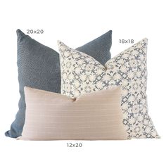 three pillows with different patterns and sizes on them, one is blue and the other has beige