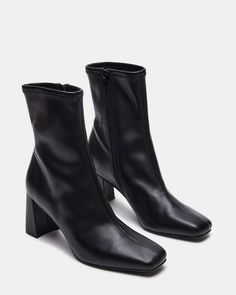 For the perfect seasonal transition style, look no further. HUSH is a sleek ankle boot with a sock-like fit and brings a chic touch to these versatile booties. 2.75 inch heel height 9.5 inch shaft circumference 6.25 inch shaft height Vegan leather or synthetic upper material Textile and vegan leather lining Vegan leath Short Black Boot, Ghosts Cbs, Leather Sock Boots, Boots Png, 2024 Wardrobe, Short Black Boots, Women's Booties, Clothing Staples, Black Square