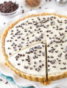 Time to take your taste buds on a Sicilian vacation! With a touch of cinnamon and some mini chocolate chips, this cannoli tart has all the great flavors of a cannoli wrapped into one simple tart. #cannolitart #cannolitartrecipe Easy Cannoli, Butter Pecan Cheesecake, Mascarpone Filling, Pecan Cheesecake, Easy Holiday Desserts, Homemade Eggnog, Pumpkin Cheesecake Recipes, Tart Dessert, Easy Holiday Recipes