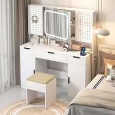 a bedroom with a bed, desk and mirror