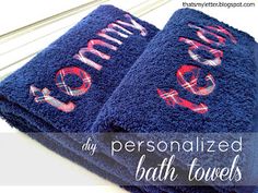 two personalized blue bath towels with the words, my personalized bath towels on them