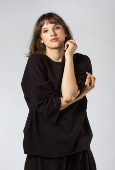 This casual black sweatshirt originally designed by shyzuka. incredibly soft and comfy top. fabric: 95% cotton, 5% elastane. one size measurements: bust: 46″ (118 cm) length: 27″ (69 cm) sleeve till neck: 22″ (56 cm) bottom: 47″ (120 cm) the model's size m (height - 180 cm / 5.9 feet) made in lithuania Minimalist T Shirt, Black Minimalist, Black Sweatshirt, Comfy Tops, Casual Black, Top Fabric, Raw Edge, Sweat Shirt, Casual Women