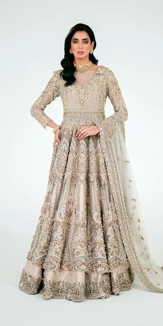 Embellished Lehenga Gown Style Pakistani Bridal Dress is a breathtaking attire adorned with embroidery and shimmering details. Crystals, cut-dana, pearls, sequins, and motifs make this premium Pakistani Wedding Dress an epitome of beauty and your foremost priority for the big day. Gown Pakistani, Work Crystals, Pakistani Gown, Embellished Lehenga, Lehenga Pakistani, Pakistani Bridal Lehenga, Pakistani Lehenga, Pakistani Bridal Dress, Bridal Dupatta