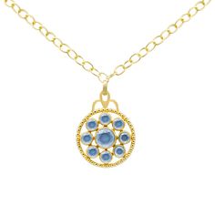 This 18k gold plated medallion necklace features a stunning gemstone design, adding a touch of sophistication and elegance. The necklace measures 17 to 18 inches, allowing for a versatile fit. Available in Tanzanite, Green Onyx, Blue Sapphire, and Peach Moonstone, each option brings its own unique hue and character. Pair this necklace with the Florentina Earrings, Giselle Stud Earrings, and Arden Ring for a coordinated and polished look. Luxury Cabochon Medallion Necklace, Yellow Gold Medallion Necklace With Cabochon, Elegant Blue Necklace With Coin Pendant, Blue Medallion Necklace With Coin Pendant, Blue Coin Pendant Jewelry, Round Sapphire Cabochon Necklaces, Round Sapphire Cabochon Necklace, Elegant Medallion Necklace With Birthstone, Elegant Medallion Birthstone Necklace