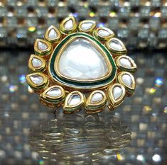 Bollywood designer kundan  ring  with gold plating are beautiful, elegent & will surely galvanize you, Adjustable Finger ring this Gold kundan ring looks beautiful  and elegant perfect for all occasion on any outfits you choose to wear (saree, salwar suits, lenga, etc.) *High quality craftsmanship 100% satisfaction guarantee  *Plated in Gold plating *adjustable finger ring *base metal for ring is copper *package include kundan ring *ready to ship from Houston TX United States GIFT- It comes in gift box perfect for gifting to your mom , sister, in laws, friends, on there birthday, wedding , bridal shower, anniversary, festival , and many more... Discover a variety of Necklace sets and Earring  only at Azzashiny.fj . our product are made from metal & alloys like Copper or Brass respectively. Indian Gold Ring, Kundan Ring, Wedding Jewelry Gold, Ring Indian, Gold Finger Rings, Gold Jewelry Gift, Kundan Jewelry, Gold Wedding Jewelry, Jewelry Indian