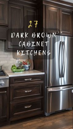 a kitchen with dark brown cabinets and stainless steel appliances