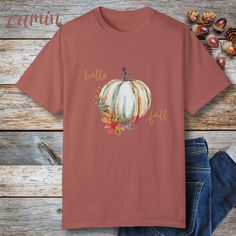 Hi there, welcome to our shop! Life's so much better when you're cozy so we've chosen the softest, most comfortable natural fiber hoodies and tees for our fun graphic designs. Happy Shopping :) https://www.etsy.com/shop/EllezHoodieHut for additional styles Say hello to fall vibes with this trendy soft tee,  soft boho florals and watercolor pumpkin greet the season perfectly in this cozy fall essential.  Ordering is simple: Select color ->  Select Size ->  Add to cart ->  Check out   .: Carefully check sizes using size chart in listing photos and confirm color choice, feel free to contact us, we're happy to help. Details: .: Soft Comfort Colors t-shirts are made with medium fabric consisting of high quality, 100% ring-spun ethically grown and harvested US cotton for long-lasting comfort. .: Comfortable Cotton T-shirt For Fall, Soft-washed Comfortable T-shirt For Fall, Soft-washed Comfort Fit T-shirt For Fall, Comfortable Fit Graphic Tee For Fall, Graphic Tee For Fall, Comfortable Graphic Tee For Fall, White Soft-washed T-shirt For Fall, Soft-washed White T-shirt For Fall, Fall Vibes Cozy