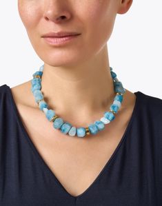 The striking blue stones adorning this necklace from Nest will bring a fresh, radiant feel to your every day ensembles. We love that each of the aquamarine, blue quartz, and gold beads are unique in shape, lending a naturally stunning look to the strand. Wear it with a neutral top or understated knit for a chic daytime look. Elegant Blue Amazonite Jewelry, Blue Beaded Necklaces With Gemstone Accents For Gift, Elegant Blue Beaded Necklaces With Gemstone Accents, Elegant Blue Beaded Necklace With Gemstone Accents, Luxury Blue Single Strand Beaded Necklace, Luxury Blue Gemstone Bead Necklaces, Luxury Blue Beaded Necklaces With Gemstone Beads, Luxury Blue Gemstone Beaded Necklaces, Luxury Blue Gemstone Beaded Necklace