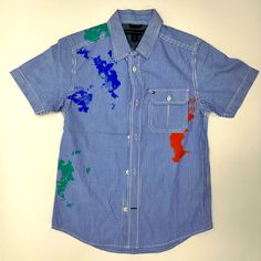 Big Kids, “Tommy Hilfiger” Button Down Color Splat Shirt. Never Worn!! Size: S/P (8-10) Color: Blue / Multi Colored Blue Shirt With Snap Buttons For Summer, Blue Summer Shirt With Snap Buttons, Tommy Hilfiger Short Sleeve Shirt For Spring, Tommy Hilfiger Spring Short Sleeve Shirt, Blue Collared Tommy Hilfiger Shirt, Tommy Hilfiger Blue Collared Shirt, Blue Short Sleeve Shirt With Buttons, Fitted Blue Tommy Hilfiger Shirt, Tommy Hilfiger Summer Button-up Shirt