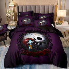 a bed with a purple comforter and two pillows on it, one has a skeleton holding a red rose