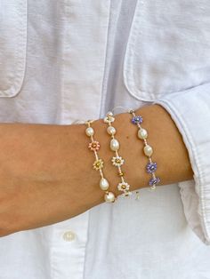 Minimal cute and dainty daisy bracelets are perfect for a natural jewelry lowers! Made using natural silk cord, pearls, 24K gold plated beads or palladium plated beads (beads with real gold or palladium layer). It's original jewelry, beaded by hand. You can combine in a lot of ways with your own jewelry and your casual or festive outfits. This bracelets are perfect for best friends! LENGTH: adjustable, the max diameter is around 9 cm/3.5 inches; the max lenth is around 28 cm/11 inches. CLOSURE: Dainty Friendship Bracelets, Delicate Adjustable Bracelets For Summer, Delicate Adjustable Summer Bracelets, Delicate Adjustable Bracelet For Summer, Adjustable Gold Pearl Flower Bracelet, Gold Daisy Jewelry For Summer, Gold Daisy-shaped Jewelry For Summer, Dainty Adjustable Beaded Bracelets With Pearl Chain, Handmade Gold Pearl Bracelet For Summer