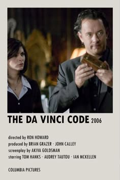 the da vinci code 2006 poster with two people looking at something in front of them