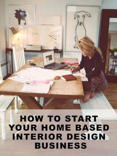 a woman sitting at a wooden table working on her laptop with the words how to start your home based interior design business