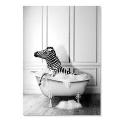 a zebra is sitting in a bathtub full of bubbles