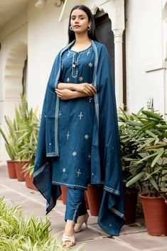 This is 3 piece set.It comes with mirror embellished kurta teamed with trouser and a dupatta to match. 3 Piece Set Fabric-Cotton Color-Navy Blue Work-Mirror embellished, embroidered & lace detailing with front & side tassels Kurta Detailing-Calf length kurta with side slits Bottom-Flared Sharara Sleeves-3/4th Sleeves Neck-Round Neck Occasion-Festive wear Washing care-Hand wash Navy Blue Mirror, Embellished Suit, Flared Sharara, Blue Mirror, Match 3, Festive Wear, Blue Mirrors, Suit Set, Embroidered Lace