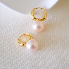 Looking for the perfect gift? Our 12mm Pink Pearl Earrings are a thoughtful choice for any special occasion! 🎁💖 Who would you gift these beautiful pearls to?” #PerfectGift #PinkPearls #JewelryMagic #GiftIdeas #Earrings #TimelessJewelry #ThoughtfulPresents #PearlGifts Pink Pearl Earrings, Pearl Gifts, Pearl Hoop Earrings, Rose Lights, Pink Pearl, Timeless Jewelry, Bridesmaid Earrings, Jewelry Earrings Hoops, Pearl Jewelry