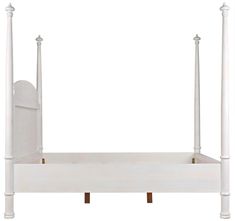 a white bed frame with two posts and a headboard on the bottom one side