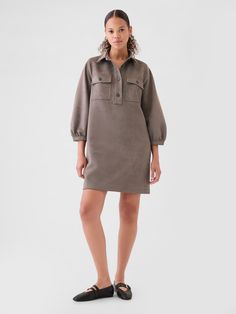 Soft vegan suede mini dress.  Point collar, button placket.  Elbow puff sleeves.  Patch pockets at chest.  Fit: Relaxed.  A shift silhouette with a relaxed & easy fit throughout.  For a Classic fit, go down one Suede Mini Dress, Plymouth Rock, Shift Mini Dress, Mini Shift Dress, Button Placket, Plymouth, Puff Sleeves, Puff Sleeve, Baby Toddler