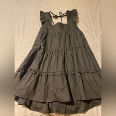 Black, Size Small, Never Worn, Still Has Tags Black Ruffled Sundress For Spring, Spring Black Cotton Mini Dress, Black Mini Sundress With Ruffles, Black Ruffled Mini Sundress, Black Cotton Mini Dress For Spring, Black Cotton Dress For A Day Out, Chic Black Sundress For Casual Wear, Black Mini Sundress For Spring, Black Cotton Vacation Dress