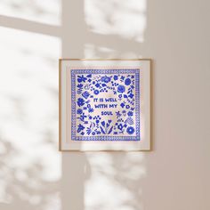 a blue and white tile with the words it is well with my soul