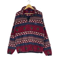 PLEASE ASK ANY QUESTION BEFORE BUYING THIS IS USED CLOTHING PLEASE DONT EXPECTED IT TO BE LIKE NEW OR IN PRISTINE CONDITION PATAGONIA SYNCHILLA GRAPHIC SNAP BUTTON FLEECE SWEATER tag Patagonia material Polyester 100% Size on tag M (Medium) Mesasures About ( Approximately) -Armpit to Ampit : 23 inch -Length (back collar down) : 28 inch Condition : used good condition 8/10 **No Tears No Stains And No Hole** 🎈PLEASE READ THE DESCRIPTION AND POLICY BEFORE BUYING 🎈ACCEPT PAYMENT: PAYPAL ONLY ALL IT Vintage Long Sleeve Fleece Jacket For Streetwear, Vintage Fleece Long Sleeve Outerwear, Vintage Long Sleeve Fleece Jacket For Winter, Vintage Long Sleeve Winter Fleece Jacket, Vintage Long Sleeve Fleece Jacket With Pockets, 90s Style Winter Outerwear With Button Closure, 90s Patagonia, Sweater Tag, Jacket Art