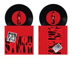 two records with black and red designs on them