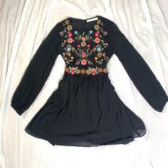 Excellent Pre-Owned Condition Authentic Zara Embroidered Dot Mesh Dress In Black, Size M Is Nwot. Blogger Favorite! **Sold Out Online Round Neck Dress With Long Puff Sleeves. Fastens With A Buttoned Opening In The Back. Features Embroideries On The Front And Interior Lining. Size Xs. Runs True To Size. No Stretch. Outer Shell 100% Polyester Lining 100% Polyester Item For Sale Pictured In Last 3 Photos. Feel Free To Reach Out With More Questions! Zara Bohemian Embroidered Dress, Zara Black Floral Dress, Zara Fitted Floral Embroidered Dress, Zara Black Floral Print Dress, Long Sleeve Boho Dress, Zara V-neck Floral Embroidered Dress, Round Neck Dress, Round Neck Dresses, Long Puff Sleeves