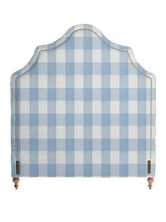 a blue and white checkered headboard is shown on an iphone screen with the text,