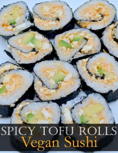 some sushi rolls on a white plate with the words spicy tofu rolls vegan sushi