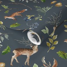 an animal themed wallpaper with deers and leaves