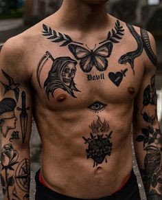 a man with many tattoos on his chest