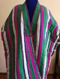 This item is old uzbek pure organic Silk Robe Beqasam Chapan from Samarqand Uzbekistan. It is made of beqasam fabric orginated in Margilon. From very old time Robes are main part of uzbek peoples Kaftan. It is especially designed for man and women of any age. It is very warm comfortable and cozy to wear. Age of an item second half of twenty century. Care:Dry cleaning. Fabric:Ikat Silk Beqasam. Free Size. Never worn before. Lenght----1meters 20centimeters Sleeve----82 centimeters. Every item will Cleaning Fabric, Hand Stitch, Silk Robe, Ikat Fabric, Vintage Fabric, Silk Fabric, Hand Stitching, Free Size, Hand Embroidery