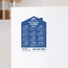 a white refrigerator freezer sitting inside of a kitchen