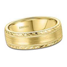 a yellow gold wedding band with braiding in the center and engraving on the side