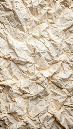 an image of wrinkled paper on the wall