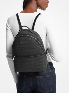 From gym sessions to city commutes, our Sheila backpack has you covered. The Signature Logo-print canvas style comes with a dedicated pocket inside for your tablet, as well as a front zip pouch for smaller items. Adjust the buckled \ straps on the back for the perfect drop. Everyday Coated Canvas Backpack With Logo, Coated Canvas Backpack With Zipper Closure For On-the-go, Coated Canvas Backpack With Zipper For School, Back To School Travel Backpack With Logo, Trendy Travel Backpack With Logo, Casual Travel Backpack With Logo, Travel Logo Bags For Back To School, Back-to-school Travel Bags With Logo, Back To School Travel Bags With Logo