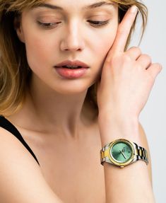 Paying homage to the bold woman in you that seeks adventure, and dares to be different, JADE was designed to inspire you to step out of your comfort zone: The chunky 36mm bezel frames an elegant green dial on a vibrant mixed gold stainless steel chain link strap. From festivals to fine dining: JADE is the perfect timeless show stopper for your wrist, transcending seasons and occasions. The only watch you’ll ever wear. Everyday Green Quartz Watch, Modern Green Watches For Gift, Trendy Green Watches As Gift, Green Stainless Steel Watch As Gift, Green Stainless Steel Watch For Gift, Green Stainless Steel Watch Gift, Green Watch With Metal Dial As Gift, Green Watch With Metal Dial For Gift, Modern Green Stainless Steel Jewelry