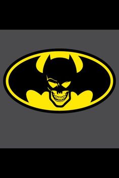 the batman symbol with a skull in it's mouth and fangs on its face