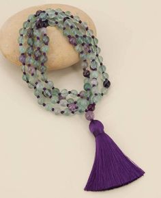 Fluorite has a calming energy that grounds the spirit. It clears away foggy and cluttered thinking, making it excellent for meditation. Fluorite heightens intuitive powers and connects us to the higher spirit within us. Knotted gemstone mala Made of 108 Fluorite gemstone beads Also features a guru bead and tassel Available in two different bead sizes, 6mm and 8mm Made in India, ships from our USA based warehouse For meditation use only, not recommended as a jewelry item Crafted using natural gem Buddha Groove, Fluorite Gemstone, Mala Meditation, Bead Sizes, 108 Bead, Gemstone Beads, The Spirit, Natural Gemstones, Meditation