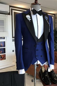 a blue tuxedo with black and white trim