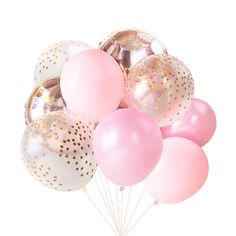 a bunch of pink and white balloons with gold confetti